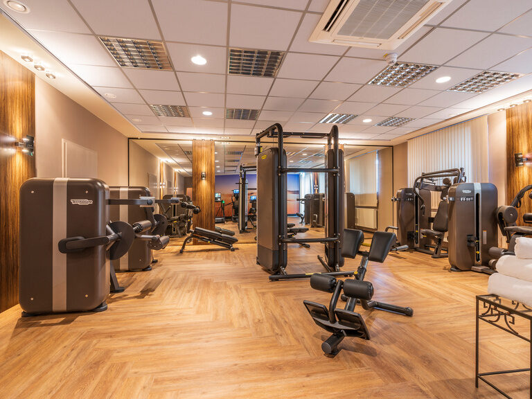Fitnesslounge mit modernsten Technogym Geräten ausgestattetes Fitnessstudio im Hotel Der Heidehof